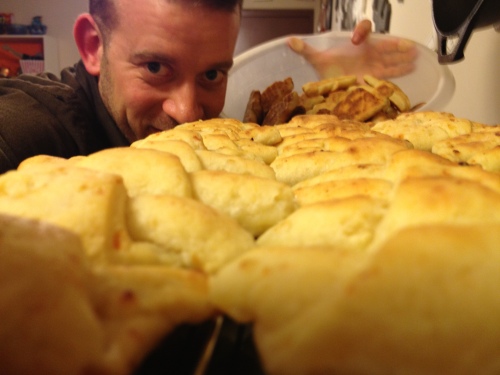 Jason Peaking Over A Batch of Beautiful Cottage Cheese Crescents